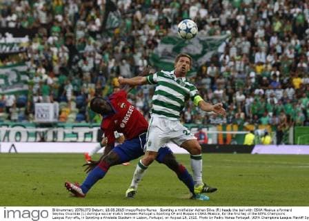 Sporting s midfielder Adrien Silva (R) heads the ball with CSKA Moskva s forward Seydou Doumbia (L) during a soccer match between Portugal s Sporting CP and Russia s CSKA Moskva, for the first leg of the UEFA Champions League Play-offs, in Sporting s Alvalade Stadium in Lisbon, Portugal, on August 18, 2015. Photo by Pedro Nunes Portugal: UEFA Champions League Playoff Sporting Vs CSKA Moskva 