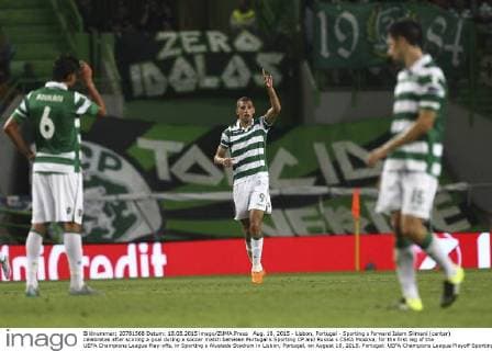 Aug. 18, 2015 - Lisbon, Portugal - Sporting s forward Islam Slimani (center) celebrates after scoring a goal during a soccer match between Portugal s Sporting CP and Russia s CSKA Moskva, for the first leg of the UEFA Champions League Play-offs, in Sporting s Alvalade Stadium in Lisbon, Portugal, on August 18, 2015. Portugal: UEFA Champions League Playoff Sporting Vs CSKA Moskva - ZUMAn272