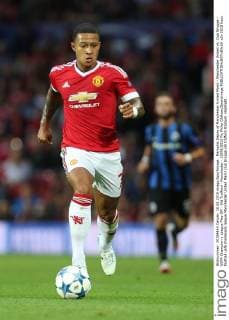 Memphis Depay of Manchester United ManU - Manchester United vs. Club Brugge - UEFA Champion s League Play Off - Old Trafford - Manchester - 18 08 2015 Pic Philip Oldham SportImage EDITORIAL USE ONLY. No use with unauthorised audio, video, data, fixture lists, club league logos or live services. Online in-match use limited to 120 images, no video emulation. No use in betting, games or single club league player publications.