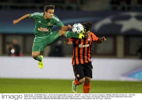 SOCCER - CL play off, Rapid vs Shakhtar VIENNA,AUSTRIA,19.AUG.15 - SOCCER - UEFA Champions League, play off, SK Rapid Wien vs FC Shakhtar Donetsk. Image shows Louis Schaub (Rapid) and Taras Stepanenko (Shakhtar). Keywords: Wien Energie. GEPAxpictures xPhilippxBrem