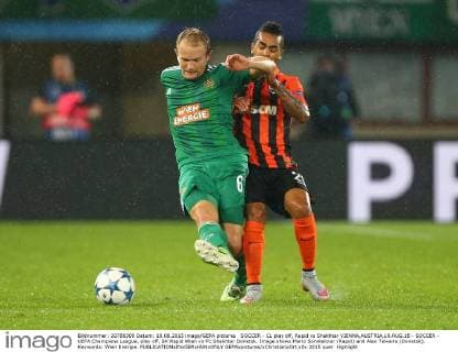 SOCCER - CL play off, Rapid vs Shakhtar VIENNA,AUSTRIA,19.AUG.15 - SOCCER - UEFA Champions League, play off, SK Rapid Wien vs FC Shakhtar Donetsk. Image shows Mario Sonnleitner (Rapid) and Alex Teixeira (Donetsk). Keywords: Wien Energie. GEPAxpictures xChristianxOrt