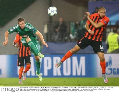 SOCCER - CL play off, Rapid vs Shakhtar VIENNA,AUSTRIA,19.AUG.15 - SOCCER - UEFA Champions League, play off, SK Rapid Wien vs FC Shakhtar Donetsk. Image shows Robert Beric (Rapid) and Yaroslav Rakitskiy (Donetsk). Keywords: Wien Energie. GEPAxpictures xChristianxOrt