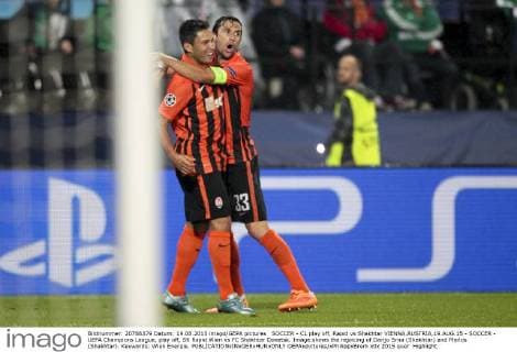 SOCCER - CL play off, Rapid vs Shakhtar VIENNA,AUSTRIA,19.AUG.15 - SOCCER - UEFA Champions League, play off, SK Rapid Wien vs FC Shakhtar Donetsk. Image shows the rejoicing of Darijo Srna (Shakhtar) and Marlos (Shakhtar). Keywords: Wien Energie. GEPAxpictures xPhilippxBrem