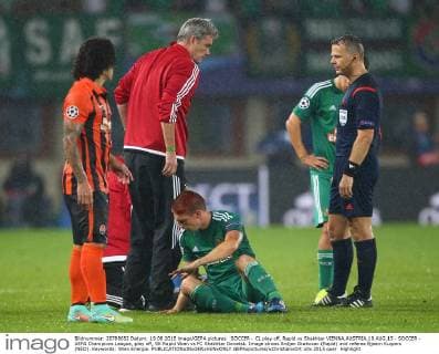 SOCCER - CL play off, Rapid vs Shakhtar VIENNA,AUSTRIA,19.AUG.15 - SOCCER - UEFA Champions League, play off, SK Rapid Wien vs FC Shakhtar Donetsk. Image shows Srdjan Grahovac (Rapid) and referee Bjoern Kuipers (NED). Keywords: Wien Energie. GEPAxpictures xChristianxOrt