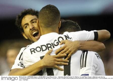 Valencia s Daniel Parejo (l), Rodrigo (c) and Paco Alcacer celebrate goal during Champions League 2015 2016 Play-Offs 1st leg match. August 19,2015.  (2015081905)