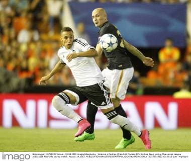 Valencia s Rodrigo (l) and AS Monaco FC s Andrea Raggi during Champions League 2015 2016 Play-Offs 1st leg match. August 19,2015.  (2015081922)