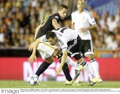 Valencia s Javi Fuego (r) and AS Monaco FC s Mario Pasalic during Champions League 2015 2016 Play-Offs 1st leg match. August 19,2015.  (2015081944)