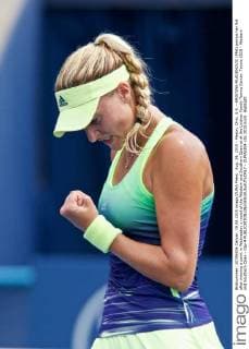 Aug. 19, 2015 - Mason, Ohio, U.S. - KRISTINA MLADENOVIC (FRA) pumps her fist after winning a point in Wednesday s round of the Western and Southern Open at at the Lindner Family Tennis Center. Tennis 2015 - Western and Southern Open - Day 4 - ZUMAs304