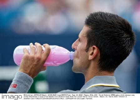 Aug. 19, 2015 - Mason, Ohio, USA - Novak Djokovic (SRB) gets a drink between sets during Wednesday s round of the Western and Southern Open at at the Lindner Family Tennis Center , Mason, Oh. Tennis 2015 - Western & Southern Open - ZUMAs304