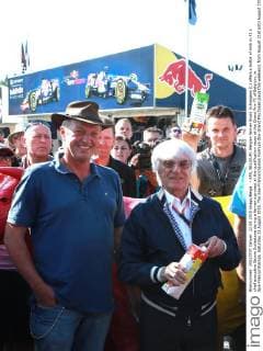 - SPA, BELGIUM: Belgian farmer Erwin Schopgens (L) offers a bottle of milk to F1 s chief executive Bernie Ecclestone during a farmer s protest at the qualification races at the Grand Prix F1 of Belgium, in Spa-Francorchamps, Saturday 22 August 2015. The Spa-Francorchamps Formula One Grand Prix takes place this weekend, from August 21st until August 23rd. GEORGESxDExCOSTER  x04684519x