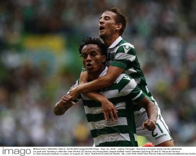 Aug. 22, 2015 - Lisbon, Portugal - Sporting s forward Andre Carrillo celebrates his goal with Sporting s defender Joao Pereira (R) during the Portuguese League football match between Sporting CP and FC Pacos de Ferreira at Jose Alvalade Stadium in Lisbon on August 22, 2015. NURPHOTO CARLOS PALMA. FBL-LIGA-POR-SPORTING-PACOS - ZUMAn230