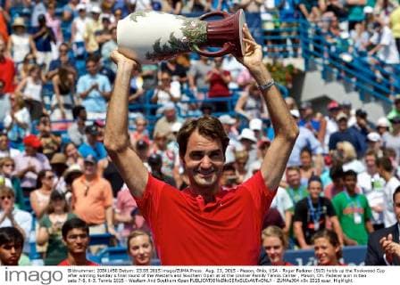 Aug. 23, 2015 - Mason, Ohio, USA - Roger Federer (SUI) holds up the Rookwood Cup after winning Sunday s final round of the Western and Southern Open at at the Lindner Family Tennis Center , Mason, Oh. Federer won in two sets 7-6, 6-3. Tennis 2015 - Western And Southern Open - ZUMAs304
