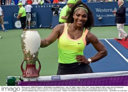 Aug. 23, 2015 - Mason, Ohio, USA - Serena Williams (USA) poses with the Rookwood Cup after winning her match at Sunday s final round of the Western and Southern Open at at the Lindner Family Tennis Center , Mason, Oh. Williams defeated Halep in two sets 6-3, 7-6. Tennis 2015 - Western And Southern Open - ZUMAs304