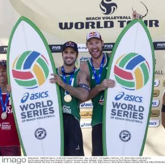 Aug. 23, 2015 - Los Angeles, California, U.S - Brazil Alison Conte Cerutti (1) and his teammate Bruno Oscar Schmidt (2) pose on the podium after defeated United States during the World Series of Beach volleyball Beachvolleyball Men Final in Long Beach, California., Sunday, August. 23, 2015. Brazil won 2-1. World Series of Beach Volleyball Men Final - ZUMAc68_