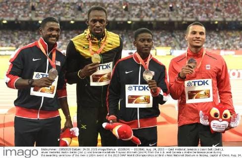 (150824) -- BEIJING, Aug. 24, 2015 -- Gold medalist Jamaica s Usain Bolt (2nd L), silver medallist Justin Gatlin (1st L) and bronze medallists Trayvon Bromell (2nd R) from the U.S. and Canada s Andre De Grasse pose during the awarding ceremony of the men s 100m event at the 2015 IAAF Wolrd Championships at Bird s Nest National Stadium in Beijing, capital of China, Aug. 24, 2015. ) (SP)CHINA-BEIJING-2015 IAAF WORLD CHAMPIONSHIPS-MEN S 100M AWARDING CEREMONY(CN) GongxLei 