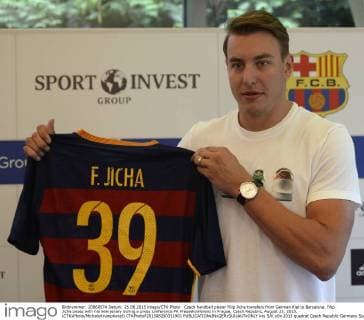 Czech handball player Filip Jicha transfers from German Kiel to Barcelona. Filip Jicha poses with his new jersey during a press conference PK Pressekonferenz in Prague, Czech Republic, August 25, 2015. (CTKxPhoto MichalxKrumphanzl) CTKPhotoP201508250311901  kru 5 K
