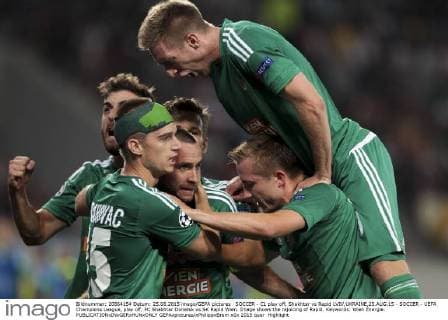 SOCCER - CL play off, Shakhtar vs Rapid LVIV,UKRAINE,25.AUG.15 - SOCCER - UEFA Champions League, play off, FC Shakhtar Donetsk vs SK Rapid Wien. Image shows the rejoicing of Rapid. Keywords: Wien Energie. GEPAxpictures xPhilippxBrem