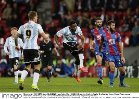 25.08.2015. London, England. Capital One Cup 2nd Round. Crystal Palace versus Shrewsbury. Shrewsbury Town s Jean-Louis Akpa Akpro has a shot from long range xCraigxMercerx  ActionPlus11653614