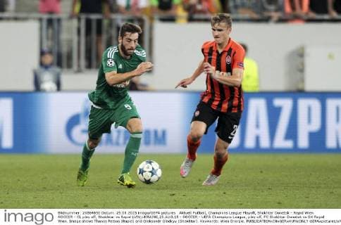 Aktuell Fußball, Champions League Playoff, Shakhtar Donetsk - Rapid Wien SOCCER - CL play off, Shakhtar vs Rapid LVIV,UKRAINE,25.AUG.15 - SOCCER - UEFA Champions League, play off, FC Shakhtar Donetsk vs SK Rapid Wien. Image shows Thanos Petsos (Rapid) and Oleksandr Gladkyy (Shakhtar). Keywords: Wien Energie. GEPAxpictures xPhilippxBrem