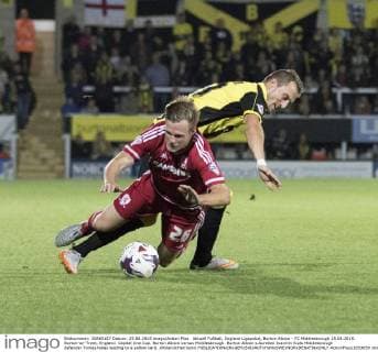 Aktuell FuÃŸball, England Ligapokal, Burton Albion - FC Middlesbrough 25.08.2015. Burton-on-Trent, England. Capital One Cup. Burton Albion versus Middlesbrough. Burton Albion s Aurelien Joachim fouls Middlesbrough defender Tomas Kalas leading to a yellow card. xRolandxHarrisonx  ActionPlus11653659