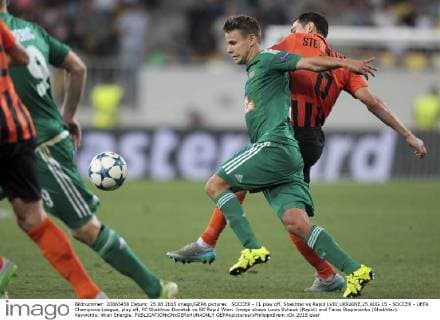 SOCCER - CL play off, Shakhtar vs Rapid LVIV,UKRAINE,25.AUG.15 - SOCCER - UEFA Champions League, play off, FC Shakhtar Donetsk vs SK Rapid Wien. Image shows Louis Schaub (Rapid) and Taras Stepanenko (Shakhtar). Keywords: Wien Energie. GEPAxpictures xPhilippxBrem