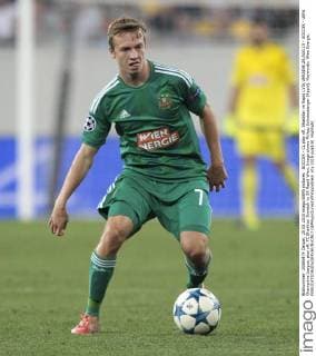 SOCCER - CL play off, Shakhtar vs Rapid LVIV,UKRAINE,25.AUG.15 - SOCCER - UEFA Champions League, play off, FC Shakhtar Donetsk vs SK Rapid Wien. Image shows Philipp Schobesberger (Rapid). Keywords: Wien Energie. GEPAxpictures xPhilippxBrem
