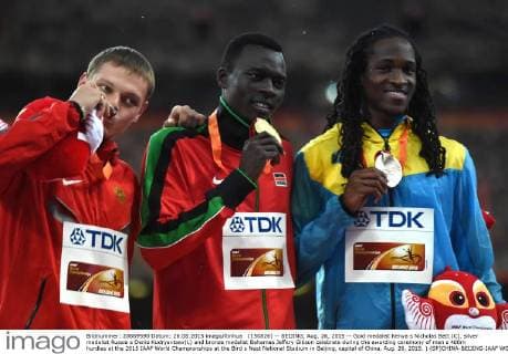 (150826) -- BEIJING, Aug. 26, 2015 -- Gold medalist Kenya s Nicholas Bett (C), silver medalist Russia s Denis Kudryavtsev(L) and bronze medalist Bahamas Jeffery Gibson celebrate during the awarding ceremony of men s 400m hurdles at the 2015 IAAF World Championships at the Bird s Nest National Stadium in Beijing, capital of China, Aug. 26, 2015. ) (SP)CHINA-BEIJING-IAAF WORLD CHAMPIONSHIPS-MEN S 400M HURDLES AWARDING CEREMONY (CN) WangxHaofei 