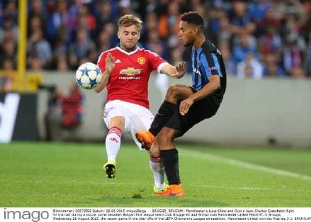- BRUGGE, BELGIUM: Manchester s Luke Shaw and Club s Jean-Charles Castelletto fight for the ball during a soccer game between Belgian first league team Club Brugge KV and British club Manchester United ManU FC in Brugge, Wednesday 26 August 2015, the return game of the play-offs of the UEFA Champions League competition. Manchester United won the first leg 3-1. BRUNOxFAHY  x04687463x