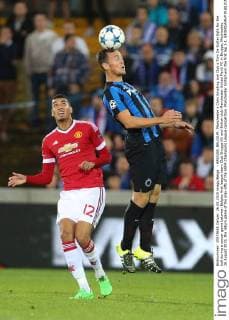 - BRUGGE, BELGIUM: Manchester s Chris Smalling and Club s Tom De Sutter fight for the ball during a soccer game between Belgian first league team Club Brugge KV and British club Manchester United ManU FC in Brugge, Wednesday 26 August 2015, the return game of the play-offs of the UEFA Champions League competition. Manchester United won the first leg 3-1. BRUNOxFAHY  x04687470x