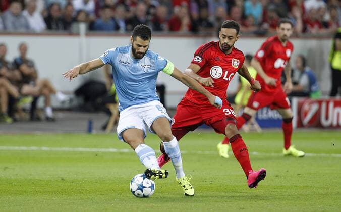 Antonio Candreva (Lazio Rom) (L) against Karim Bellarabi (Bayer 04 Leverkusen) during the Championsleague Qualification between Bayer 04 Leverkusen and Lazio Rom, Bayarena in Leverkusen on August 26., 2015. Bayer 04 Leverkusen vs. Lazi Rom in der Qualifikation der Champions League der Saison 2015 2016 am 26. August 2015.