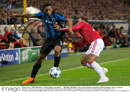 - BRUGGE, BELGIUM: Club s Jean-Charles Castelletto and Manchester s Memphis Depay fight for the ball during a soccer game between Belgian first league team Club Brugge KV and British club Manchester United ManU FC in Brugge, Wednesday 26 August 2015, the return game of the play-offs of the UEFA Champions League competition. Manchester United won the first leg 3-1. KURTxDESPLENTER  x04687482x