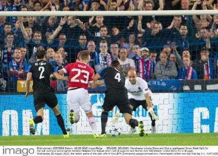 - BRUGGE, BELGIUM: Manchester s Luke Shaw and Club s goalkeeper Sinan Bolat fight for the ball during a soccer game between Belgian first league team Club Brugge KV and British club Manchester United ManU FC in Brugge, Wednesday 26 August 2015, the return game of the play-offs of the UEFA Champions League competition. Manchester United won the first leg 3-1. KURTxDESPLENTER  x04687496x