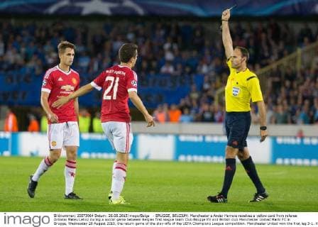 - BRUGGE, BELGIUM: Manchester s Ander Herrera receives a yellow card from referee Antonio Mateu Lahoz during a soccer game between Belgian first league team Club Brugge KV and British club Manchester United ManU FC in Brugge, Wednesday 26 August 2015, the return game of the play-offs of the UEFA Champions League competition. Manchester United won the first leg 3-1. KURTxDESPLENTER x04687522x