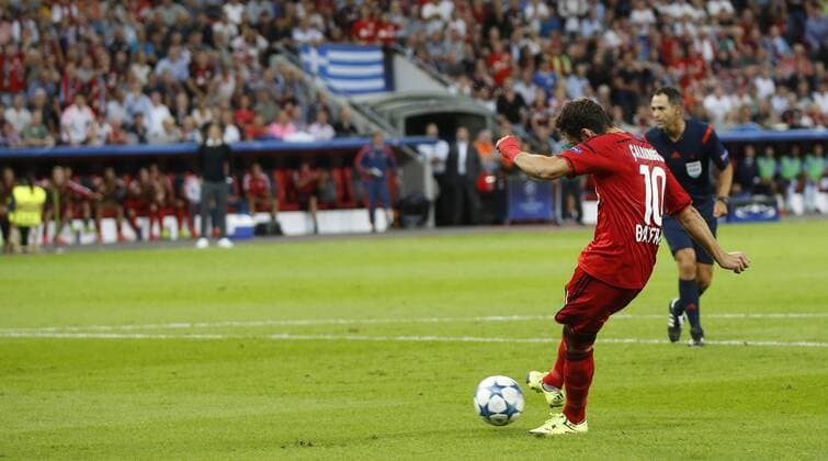 Hakan Calhanoglu (Bayer 04 Leverkusen) scoring the 1:0 goal during the Championsleague Qualification between Bayer 04 Leverkusen and Lazio Rom, Bayarena in Leverkusen on August 26., 2015. Bayer 04 Leverkusen vs. Lazi Rom in der Qualifikation der Champions League der Saison 2015 2016 am 26. August 2015.