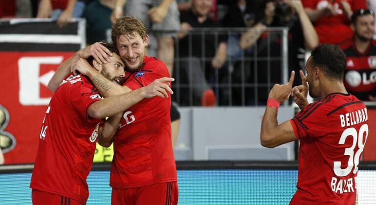 Admir Mehmedi (Bayer 04 Leverkusen) (L) celebrates scoring the 2:0 with Stefan Kießling (Bayer 04 Leverkusen) (M) and Karim Bellarabi (Bayer 04 Leverkusen) during the Championsleague Qualification between Bayer 04 Leverkusen and Lazio Rom, Bayarena in Leverkusen on August 26., 2015. Bayer 04 Leverkusen vs. Lazi Rom in der Qualifikation der Champions League der Saison 2015 2016 am 26. August 2015.