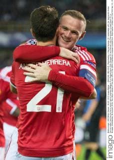 - BRUGGE, BELGIUM: Manchester s Wayne Rooney (R) celebrates with his teammate Ander Herrera after scoring during a soccer game between Belgian first league team Club Brugge KV and British club Manchester United ManU FC in Brugge, Wednesday 26 August 2015, the return game of the play-offs of the UEFA Champions League competition. Manchester United won the first leg 3-1. KURTxDESPLENTER  x04687598x