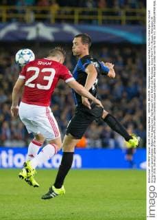 - BRUGGE, BELGIUM: Manchester s Luke Shaw and Club s Tom De Sutter fight for the ball during a soccer game between Belgian first league team Club Brugge KV and British club Manchester United ManU FC in Brugge, Wednesday 26 August 2015, the return game of the play-offs of the UEFA Champions League competition. Manchester United won the first leg 3-1. KURTxDESPLENTER x04687611x