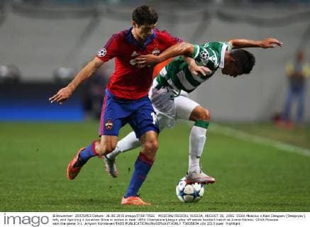 MOSCOW REGION, RUSSIA. AUGUST 26, 2015. CSKA Moscow s Alan Dzagoev (Dzagoyev), left, and Sporting s Jonathan Silva in action in their UEFA Champions League play-off series football match at Arena Khimki. CSKA Moscow won the game 3-1. Artyom Korotayev TASS  TS00B834