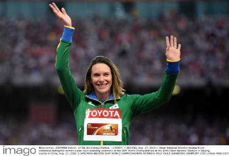 (150827) -- BEIJING, Aug. 27, 2015 -- Silver medalist Brazil s Fabiana Murer celebrates during the women s pole vault awarding ceremony at the IAAF World Championships at the Bird s Nest Naitonal Stadium in Beijing, capital of China, Aug. 27, 2015. ) (SP)CHINA-BEIJING-IAAF WORLD CHAMPIONSHIPS-WOMEN S POLE VAULT AWARDING CEREMONY (CN) LixWen 