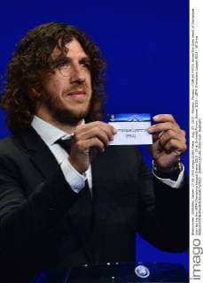 Aug. 27, 2015 - Monaco, Monaco - CARLES PUYOL shows the draw result of Olympique Lyon during the UEFA Champions League Draws 2015 - 16 at Grimaldi Forum. Soccer 2015 - UEFA Champions League 2015 - 16 Draw  - ZUMAm119