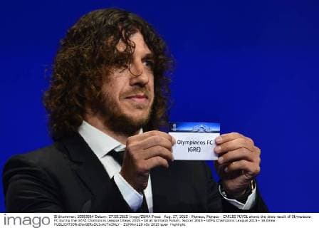 Aug. 27, 2015 - Monaco, Monaco - CARLES PUYOL shows the draw result of Olympiacos FC during the UEFA Champions League Draws 2015 - 16 at Grimaldi Forum. Soccer 2015 - UEFA Champions League 2015 - 16 Draw  - ZUMAm119