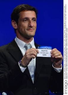 Aug. 27, 2015 - Monaco, Monaco - JULIANO BELLETTI ex Barcelona soccer player shows the draw result of Bayern Leverkusen during the UEFA Champions League Draws 2015 - 16 at Grimaldi Forum. Soccer 2015 - UEFA Champions League 2015 - 16 Draw  - ZUMAm119