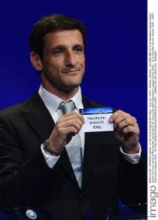 Aug. 27, 2015 - Monaco, Monaco - JULIANO BELLETTI ex Barcelona soccer player shows the draw result of Manchester United ManU FC during the UEFA Champions League Draws 2015 - 16 at Grimaldi Forum. Soccer 2015 - UEFA Champions League 2015 - 16 Draw  - ZUMAm119