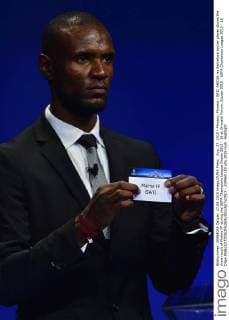 Aug. 27, 2015 - Monaco, Monaco - ERIC ABIDAL ex Barcelona soccer player shows the draw result of Malmo FF during the UEFA Champions League Draws 2015 - 16 at Grimaldi Forum. Soccer 2015 - UEFA Champions League 2015 - 16 Draw  - ZUMAm119