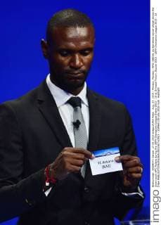Aug. 27, 2015 - Monaco, Monaco - ERIC ABIDAL ex Barcelona soccer player shows the draw result ofFC Astana during the UEFA Champions League Draws 2015 - 16 at Grimaldi Forum. Soccer 2015 - UEFA Champions League 2015 - 16 Draw  - ZUMAm119