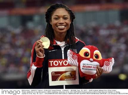 (150828) -- BEIJING, Aug. 28, 2015 -- Gold medalist Allyson Felix of the United States celebrates during the women s 400m awarding ceremony at the 2015 IAAF World Championships at Bird s Nest National Stadium in Bejing, capital of China, Aug. 28, 2015. ) (SP)CHINA-BEIJING-IAAF WORLD CHAMPIONSHIPS-WOMEN S 400M AWARDING CEREMONY (CN) GongxLei 