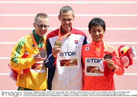 BEIJING, CHINA. AUGUST 29, 2015. Silver medalist Jared Tallent of Australia, gold medalist Matej Toth of Slovakia, and bronze medalist Takayuki Tanii of Japan (L-R) pose at a victory ceremony for the men s 50km race walk final on Day 8 of the 15th IAAF World Championships in Athletics, at the National Stadium. Valery Sharifulin TASS  TS00BD0A