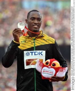 (150829) -- BEIJING, Aug. 29, 2015 -- Silver medalist Hansle Parchment of Jamaica poses during the awarding ceremony for the men s 110m hurdles at the 2015 IAAF World Championships at the Bird s Nest National Stadium in Beijing, capital of China, Aug. 29, 2015. ) (SP)CHINA-BEIJING-IAAF WORLD CHAMPIONSHIPS-MEN S 110M HURDLES AWARDING CEREMONY (CN) LixWen 