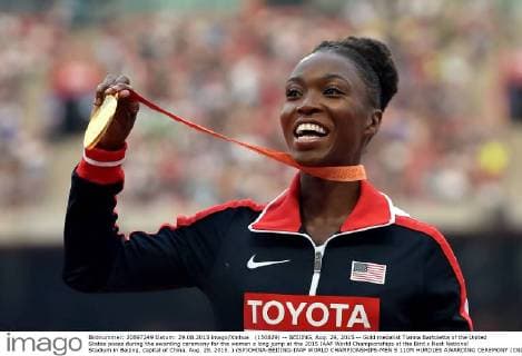 (150829) -- BEIJING, Aug. 29, 2015 -- Gold medalist Tianna Bartoletta of the United States poses during the awarding ceremony for the women s long jump at the 2015 IAAF World Championships at the Bird s Nest National Stadium in Beijing, capital of China, Aug. 29, 2015. ) (SP)CHINA-BEIJING-IAAF WORLD CHAMPIONSHIPS-MEN S 110M HURDLES AWARDING CEREMONY (CN) LixWen 