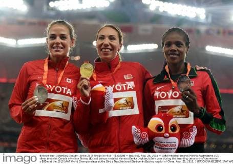 (150829) -- BEIJING, Aug. 29, 2015 -- Gold medalist Belarus Marina Arzamasova (C), silver medalist Canada s Melissa Bishop (L) and bronze medalist Kenya s Eunice Jepkoech Sum pose during the awarding ceremony of the women s 800m at the 2015 IAAF World Championships at the Bird s Nest National Stadium in Beijing, capital of China, Aug. 29, 2015. ) (SP)CHINA-BEIJING-IAAF WORLD CHAMPIONSHIPS-WOMEN S 800M AWARDING CEREMONY (CN) YuexYuewei 